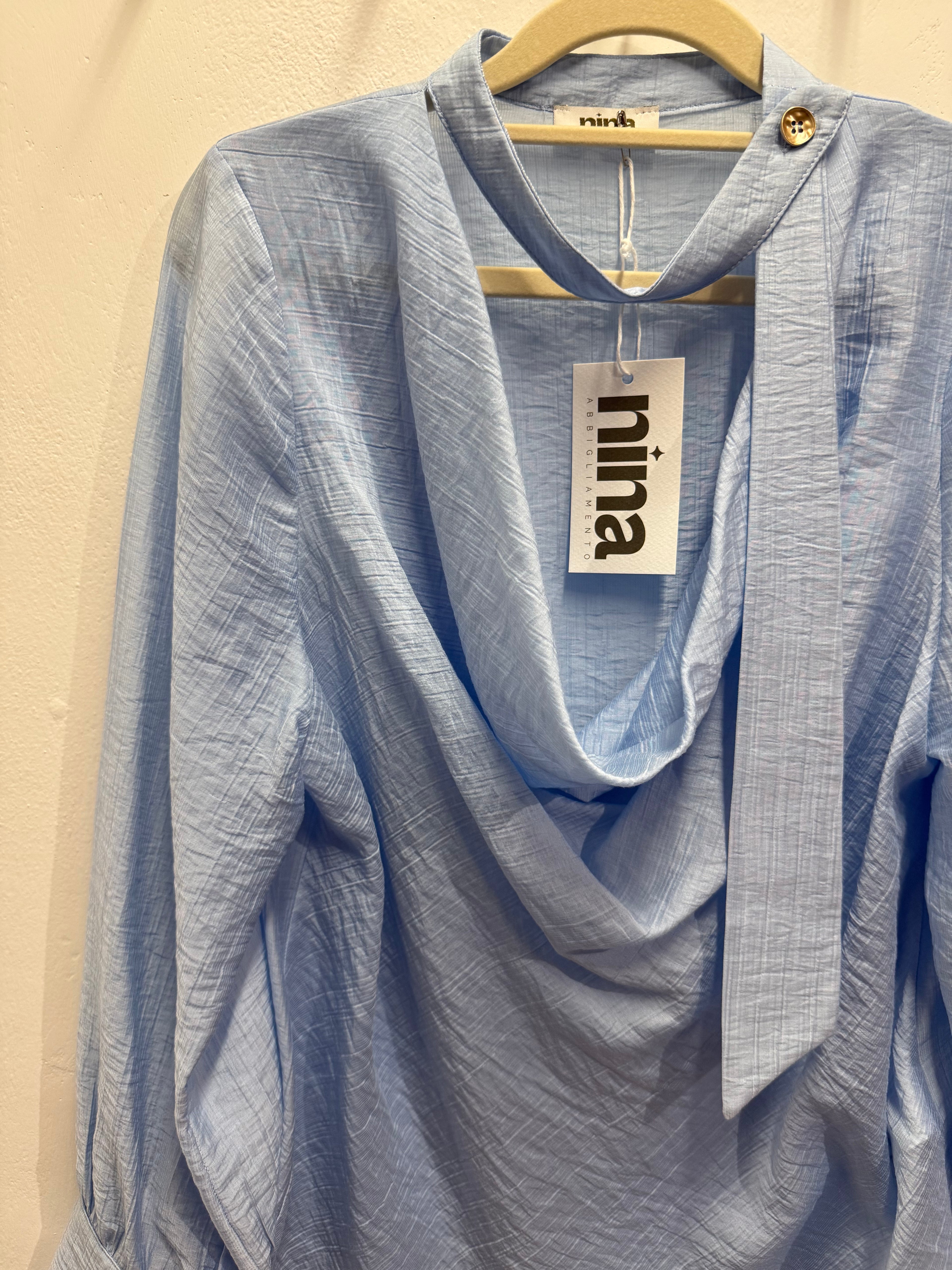 Blusa tinta unita