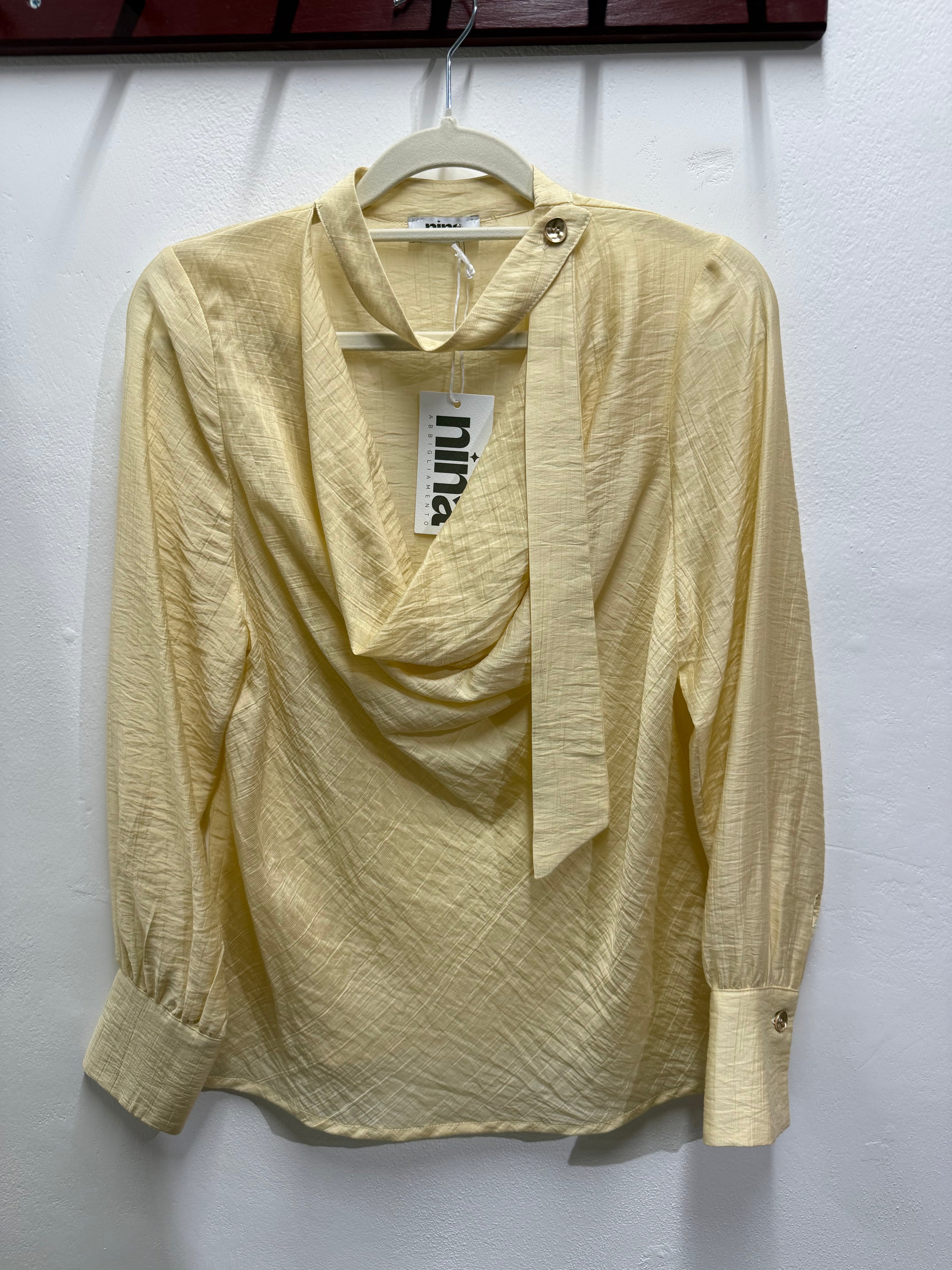 Blusa tinta unita