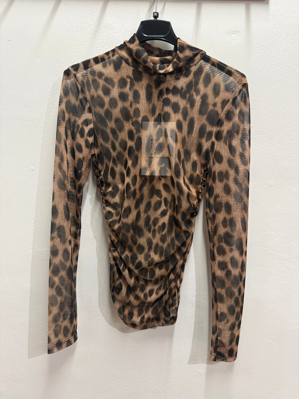 Maglia trasparente maculata